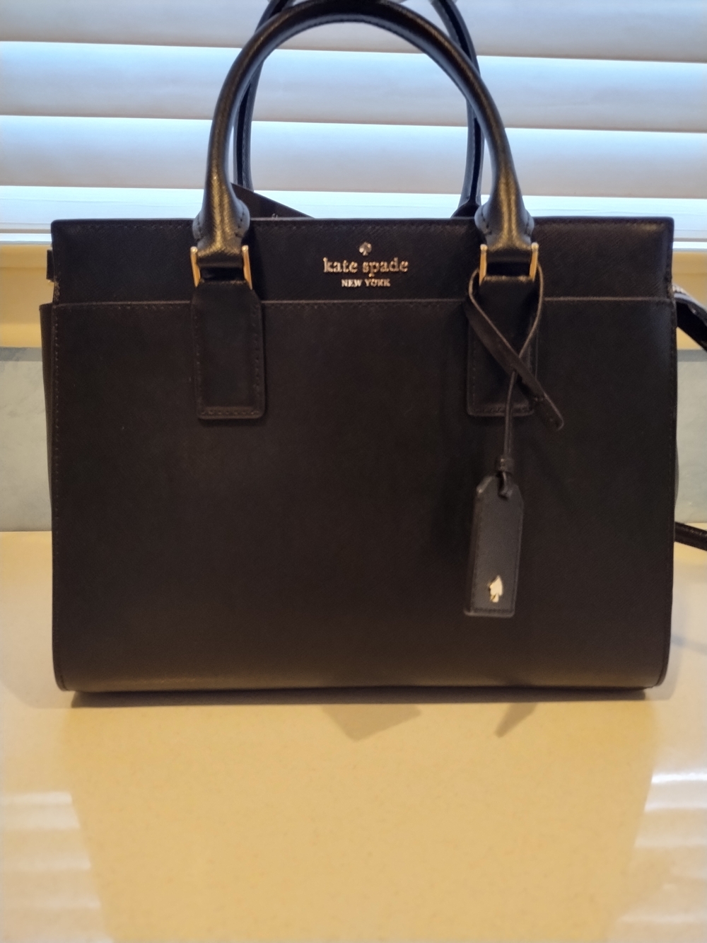 kate spade black leather tote with gold hardware